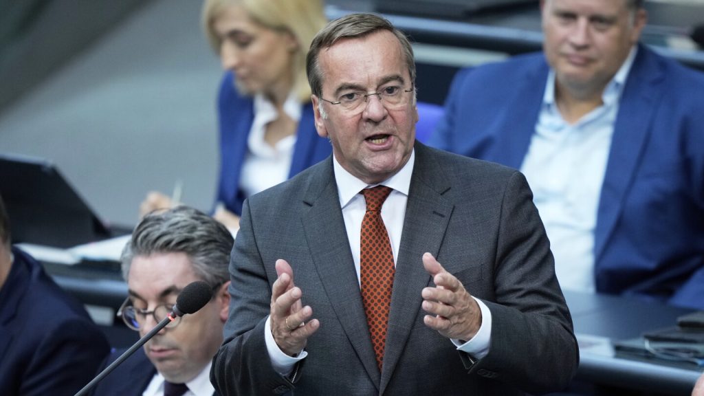 German defense minister says Russia is tracking two satellites used by the German military