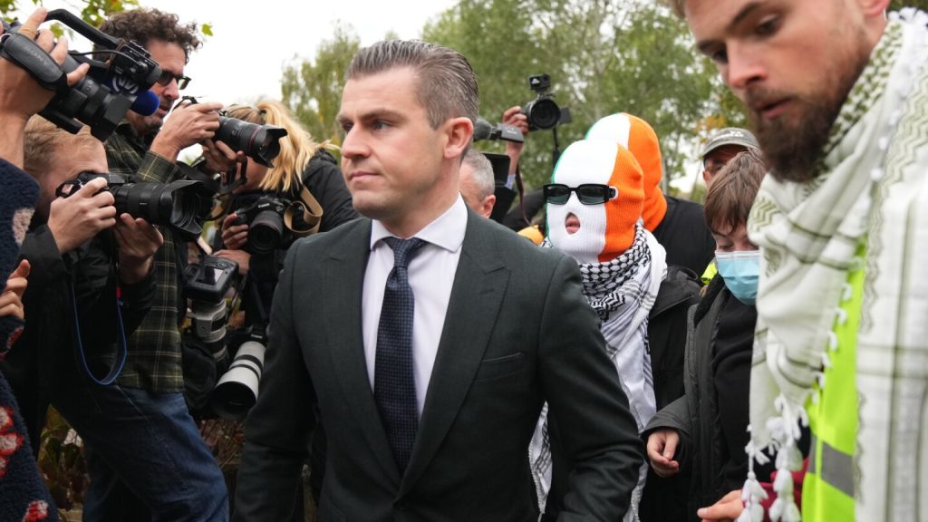 British court throws out terror-related charge against Kneecap member