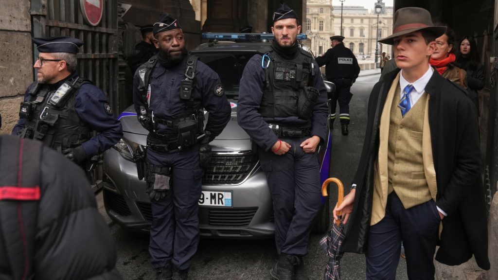 Mystery man in an AP photo after the Louvre heist creates a buzz