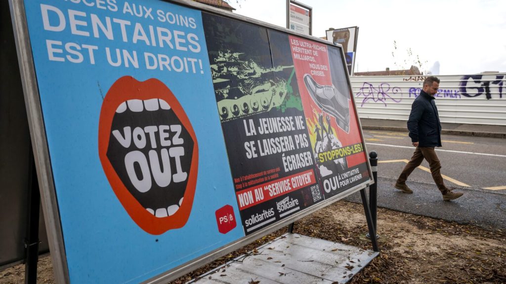 Swiss voters consider whether women, like all male citizens, must do national service