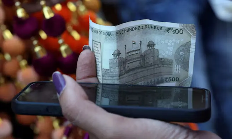 Indian rupee weakens as corporate dollar outflows eclipse Fed boost – Markets